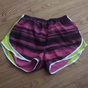 Black/pink/yellow Nike running shorts